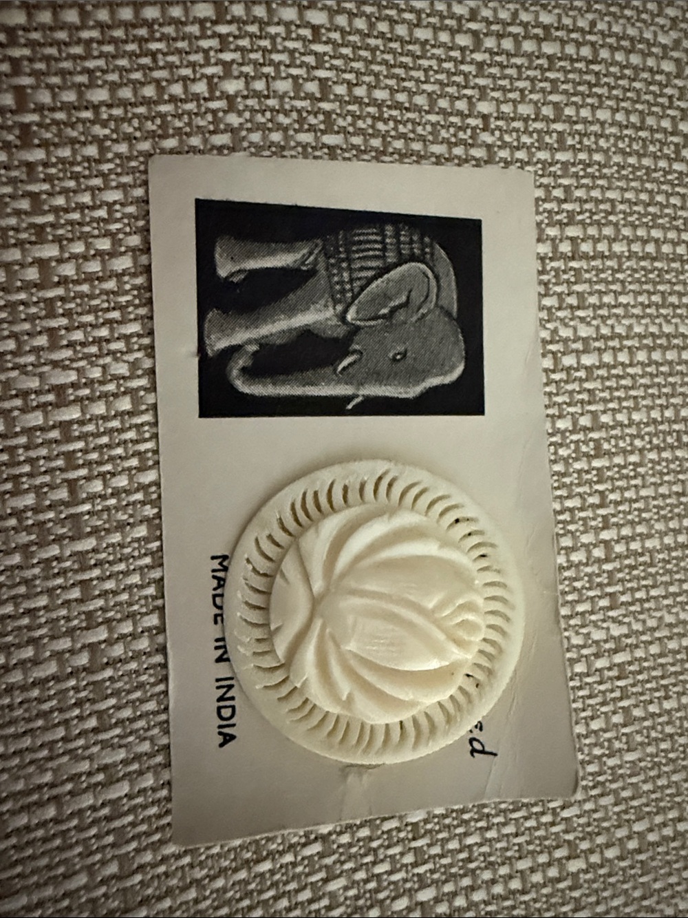 vintage handmade brooch featuring a carved white Oriental lotus flower